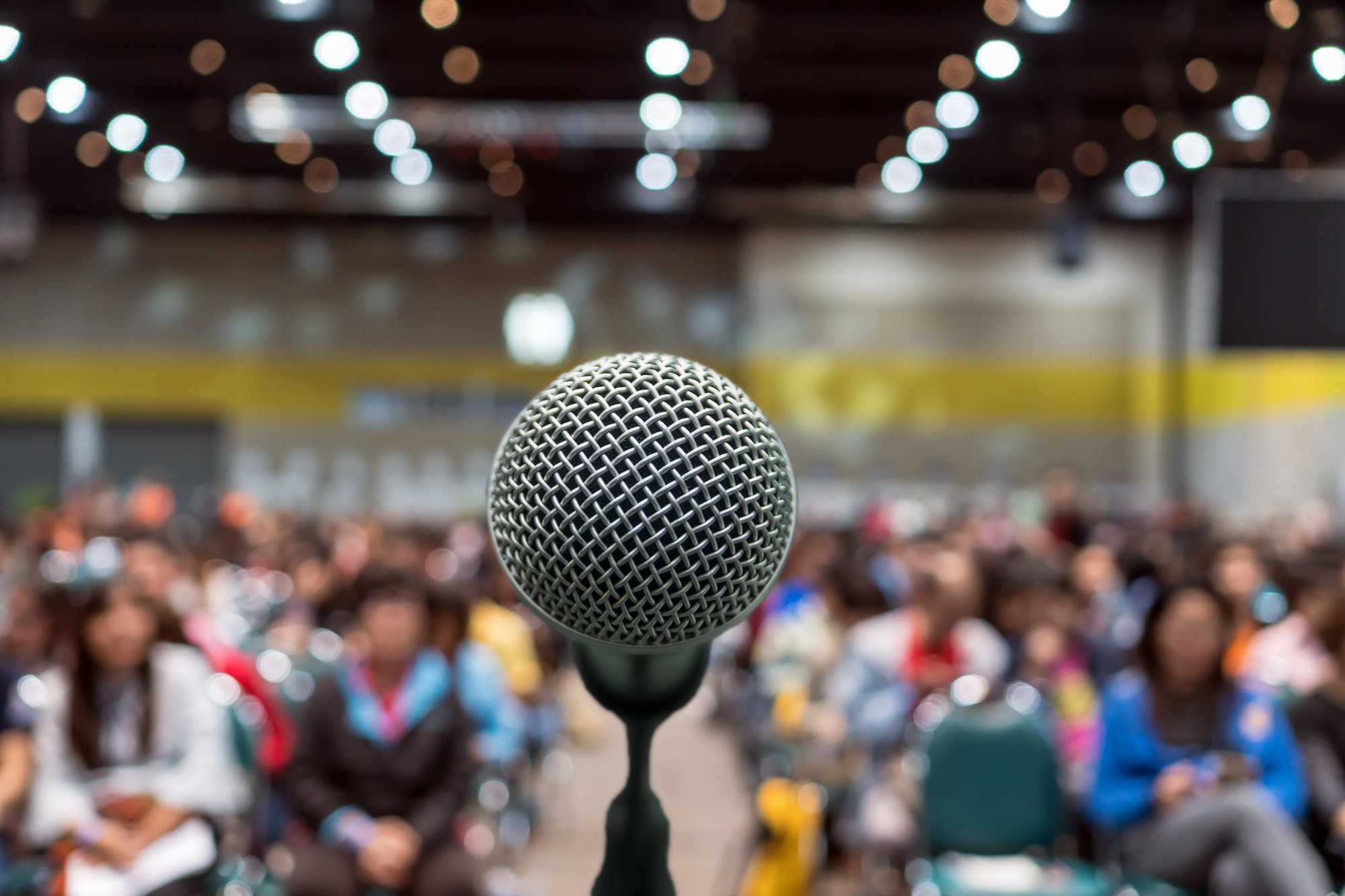 microphone-abstract-blurred-photo-conference-hall-seminar-room-exhibition-center-b